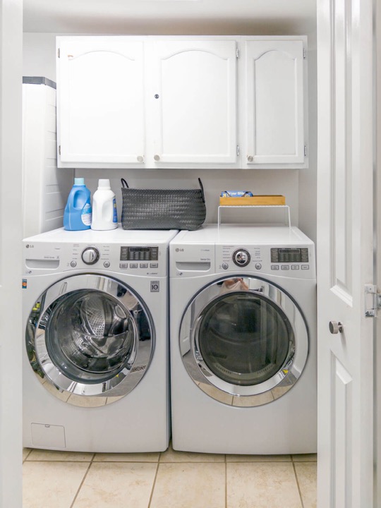 In-home washer and dryer in a white laundry closet